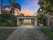 NORTH FACING BUNGALOW IN A PREMIER COASTAL ADDRESS