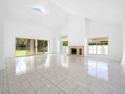 North Facing Golf Course Haven in Exclusive Palm Meadows...