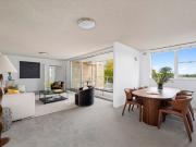 North facing strata apartment with lift access & parking