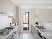 North facing top floor apartment in ultra convenient locale