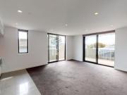 North West Corner Apartment with Large Wraparound Balcony