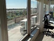 Oficina con vista panoramica al rio