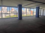 Oficinas planta libre sobre 9 de Julio con cocheras