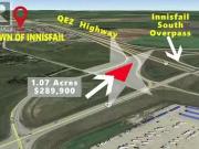 On Highway 54, Innisfail, AB, T4G 0E4 vacant land for sale.