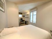 On the ground floor of a building with a courtyard, a...