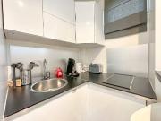 On the ground floor of a building with a courtyard, a... On the ground floor of a building with a courtyard, a...