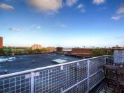 One double bedroom unfurnished top floor flat with a...