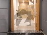 One kanal beautiful designer house with modren front...