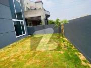 One kanal beautiful designer house with modren front...