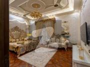 One kanal luxury bungalow at a very hot location near...