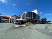 OPEN PLAN OFFICE WITH OUTSTANDING SIGNAGE AND EXPOSURE