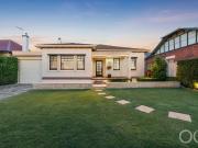 Open the Door to a Beautifully Updated 1930's Home...