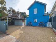 Open the Door to a Charming Cottage and Self Contained...