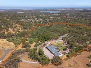 Open the Door to Country Living With City Location