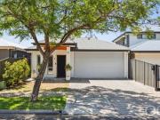 Open the Door to Immaculate Courtyard Living