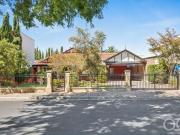 Open the Door to Single Level Comfort in a Prime Location