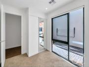 Open the Door to Versatile Three Level Living with Dual...