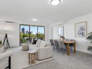 Oversized city view apartment in resort style complex