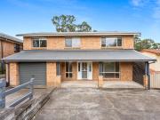Oversized Family Home with Lake Glimpses