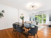 Oversized, north facing apartment in tree lined street