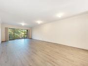 Oversized Three Bedroom Apartment in Serene Garden Setting