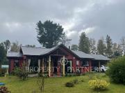 Parcela con casa en sector Cayumapu, distante a 17 km de...
