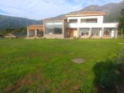 PARCELA CON CASA VISTA HERMOSA EN CONDOMINIO LA AURORA