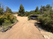 PARCELA CON CASA Y CABAÑAS EN CALEU