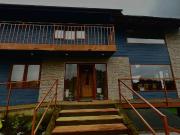 Parcela con propiedad y dos cabañas