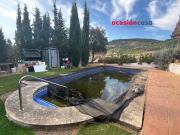 PARCELA CON VIVIENDA Y PISCINA A LA VENTA