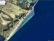 Parcela En Venta En Puqueldón, Con Orilla De Playa Y Vista