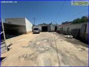 Parcela rústica vallada con almacén