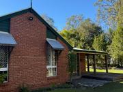 peaceful acreage living with exceptional shedding & storage