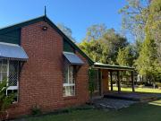 Peaceful Acreage Living with Exceptional Shedding & Storage