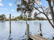 Peaceful waterfront living with pool