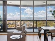 Penthouse Luxury with Rooftop Entertaining & Parkland Views