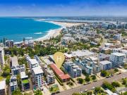 Perfectly Positioned Top Floor Unit with Ocean Glimpses
