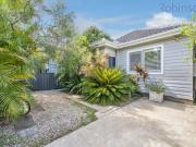 Period soul, modern comfort and a lush, private backyard...