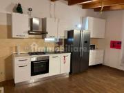 PIANA DEL SOLE BILOCALE CON GIARDINO E POSTO AUTO