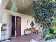 Porzione di Villa Bifamiliare con giardino