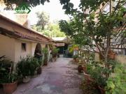 Prédio, à Av da Liberdade com garagem, logradouro e jardim