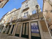 Prédio com 2 habitações e 1 loja de comércio Baixa de...