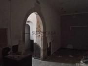 Prédio com estabelecimento comercial + T2+1 Beja