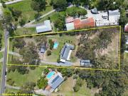 Prestigious Acreage Living in Picturesque Tallai