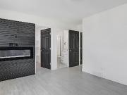 Primary Bedroom With A Fireplace