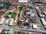 PRIME COMMERCIAL LOT WITH INCOME GENERATING HOTEL — FOR SALE