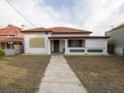 Prime Investment Opportunity: Low Maintenance 4 Bedroom Home