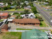 Prime Investment Opportunity: Three Unit Complex in...