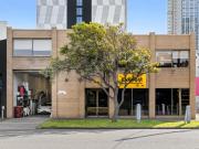 PRIMELY POSITIONED 3 LEVEL OFFICE & WAREHOUSE !
