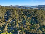 Private and Tranquil Dual Acreage Living in Picturesque...